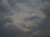 Gibbous among the Clouds