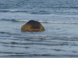 Boulder in the Waves