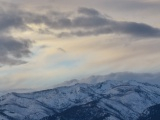 Clouds beyond the Mountains