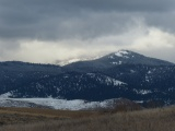 Grey Clouds, Snowy Hills