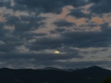 Moon Peeking through Patchy Sky