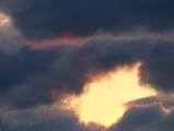 Magenta Highlights on Slate Clouds