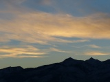 Bright Clouds over Mountain Profile