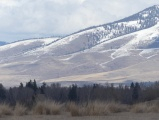 Lines of Snow Tracing Mountains