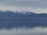 Blue Light on Lake and Mountains