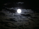 Strawberry Moon on a Sea of Clouds