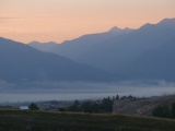 Sunset over Fog Streaked Valley