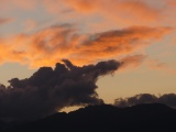 Cloud Perched on a Mountain