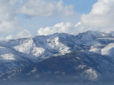 Snowy Mountains under January Skies