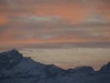 Soft Clouds over Shaded Mountains