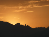 Silhouette against an Orange Sky