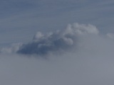 Fluffy Cloud above Fog