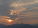 Setting Sun in a Smoky Sky