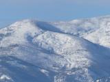 Snowy Mountains and Blue Sky