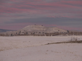 Evening Twilight on a Snowy Hill