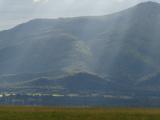Soft Sunbeams over Mountain Folds