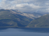 Fog below Sunlit Mountains