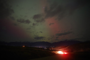 Car Lights below the Aurora