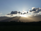 Sunbeams around the Mountains