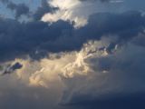 Distant Storm at Sunset