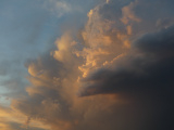 Sunset Illumination on Tall Clouds