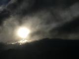 Brilliant Sun through Cloudy Sky