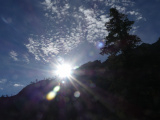 Sun clearing the Canyon Wall