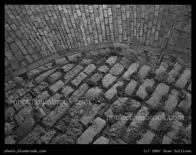Harvard Square Stones - A view down at the stones and bricks forming a sidewalk, and surrounding area, in Harvard Square, Cambridge MA