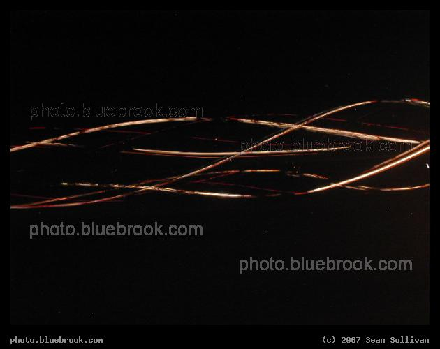 Braided Strands of Light - A time exposure of passing lights, from the side window of a car on US-3.