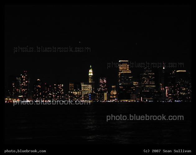 New York Skyline - The New York City skyline, looking across the Hudson River from Jersey City NJ, with Mars rising above the city