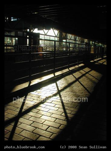 Alewife Sunbeam - Sunlight falling onto a waiting area at the Alewife MBTA subway station busway,
