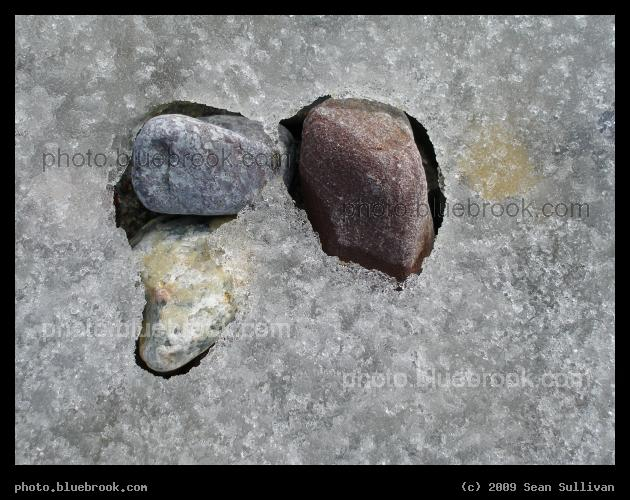 Ice and Pebbles - Pebbles peeking through a layer of ice, Revere Beach MA