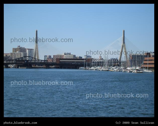 Harbor and Bridges - View from Boston Harbor towards the Zakim (light, tall) and Charlestown (dark, low) bridges