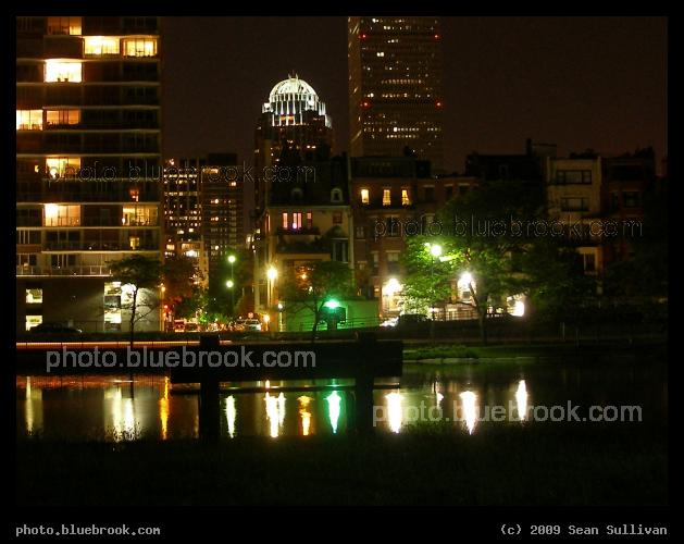 Storrow at Fairfield - Looking across a pond at the Boston Esplanade towards the Back Bay district