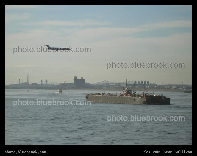 Modes of Transportation - Boats on Boston Harbor, and an airplane on approach to Logan Aiport, with the Tobin Bridge in the distance