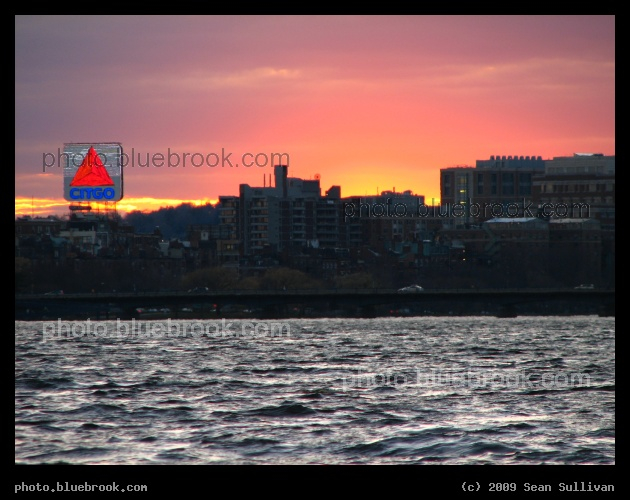 Sunset over Kenmore - A view from the Boston Esplanade at sunset, looking across the Charles River towards the Citgo sign in the Kenmore district