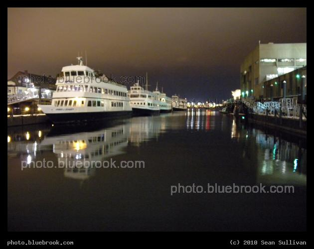 Row of Boats at Boston Harbor - Boston Harbor at night beside the Aquarium