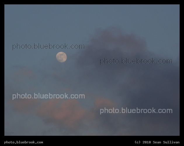 Moon and Pastel Clouds - Low clouds passing across the full moon at sunset, Jamaica Plain MA