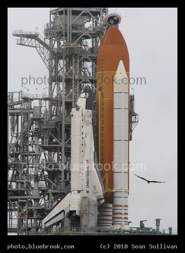 Waiting for Launch - Space shuttle Discovery on launch pad 39-A during a weather delay, seen from remote camera site 3 during camera reset