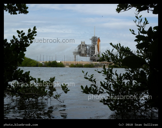 Window Between the Plants - Space shuttle Discovery at the Kennedy Space Center, launch pad 39-A
