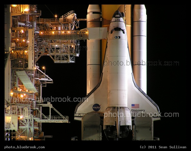 Discovery - Space shuttle Discovery at launch pad 39-A during preparations for flight STS-133