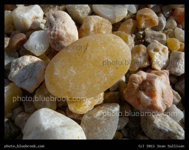Orange Stone - A close-up view of a rock on the Kennedy Space Center crawlerway near the approach to launch pad 39-B