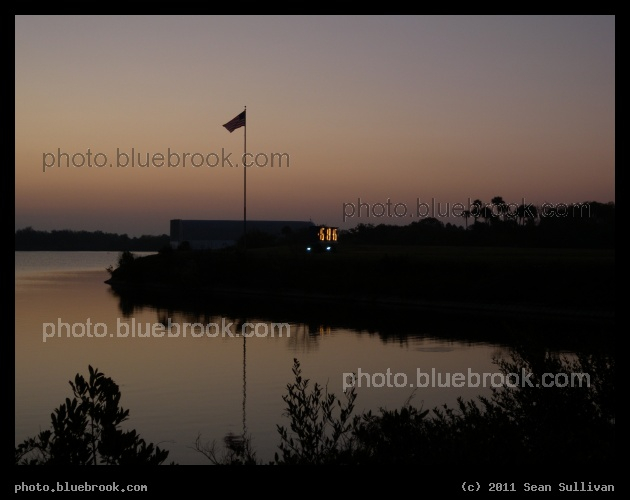 Countdown before Sunrise - Kennedy Space Center press site, with the countdown clock before sunrise on the day before the launch of Discovery on flight STS-133