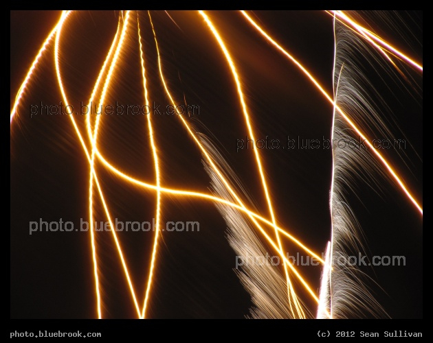 Streamers of Light - First Night 2012 fireworks over Boston Harbor