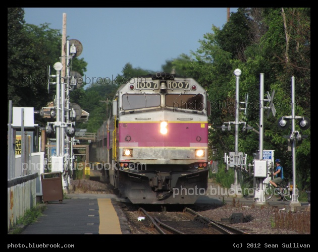 Railroad Crossing - An outbound MBTA commuter rail train crossing Moody St and approaching the platform at Waltham station, Waltham MA