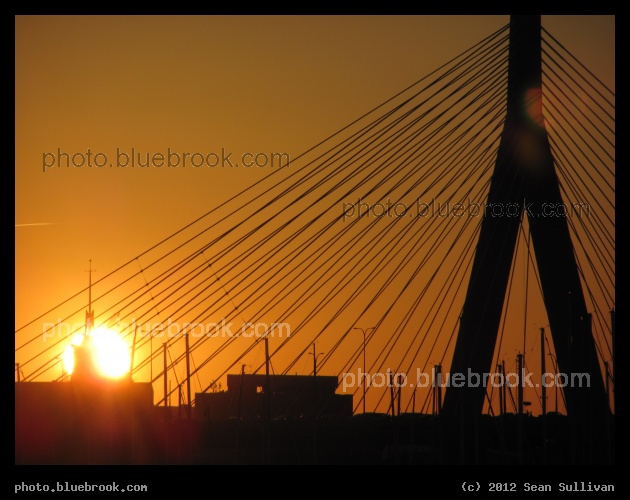 Solar Orange - Sunset behind the Zakim Bridge (I-93) and the Museum of Science, Boston MA
