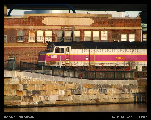 Signal Tower A - MBTA commuter rail engine near the Charles River crossing beside North Station, Boston MA