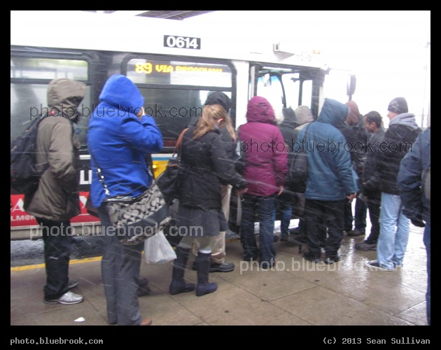 Fleeing the Blizzard - Three hours before service was suspended due to an approaching blizzard, passengers boarding an MBTA bus at Sullivan Square station, Charlestown MA