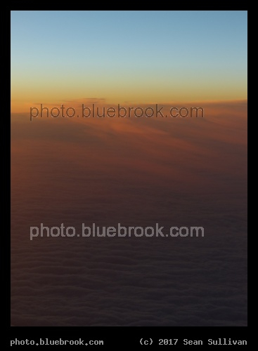 Sunset above the Clouds - From an airplane over the North Atlantic