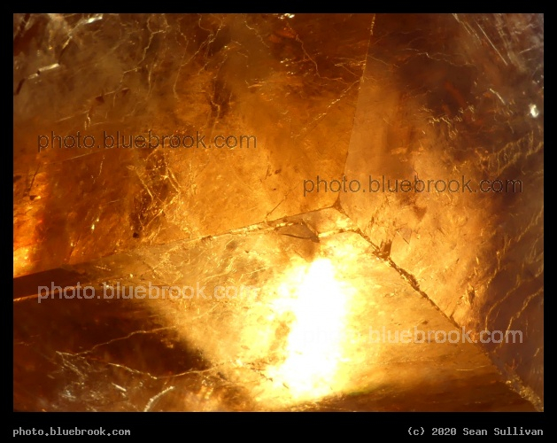 Rhombohedral Orange Calcite Detail - Sun through stone, Corvallis MT